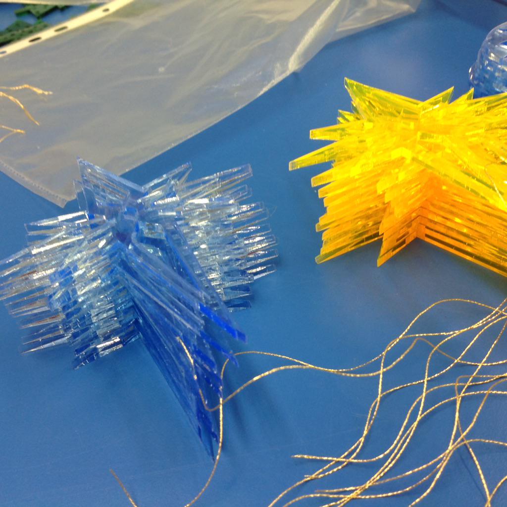capeenterprise's tweet photo. threading the decorations http://t.co/6ZAnIIyXA7