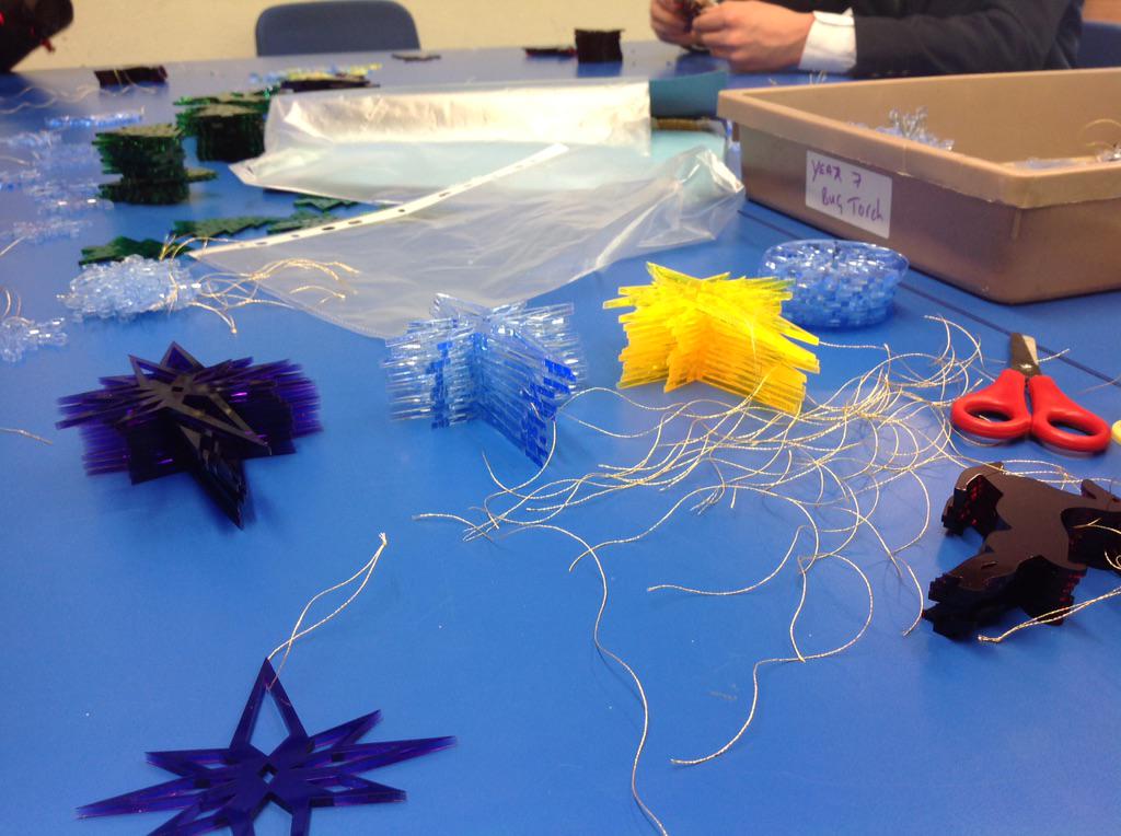 capeenterprise's tweet photo. threading the decorations http://t.co/6ZAnIIyXA7
