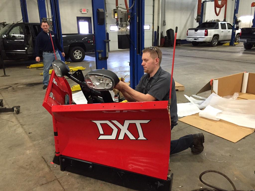 Lenz technician Nick working hard another BOSS plow project. #lenztruck #bossplow #workhardplayhard