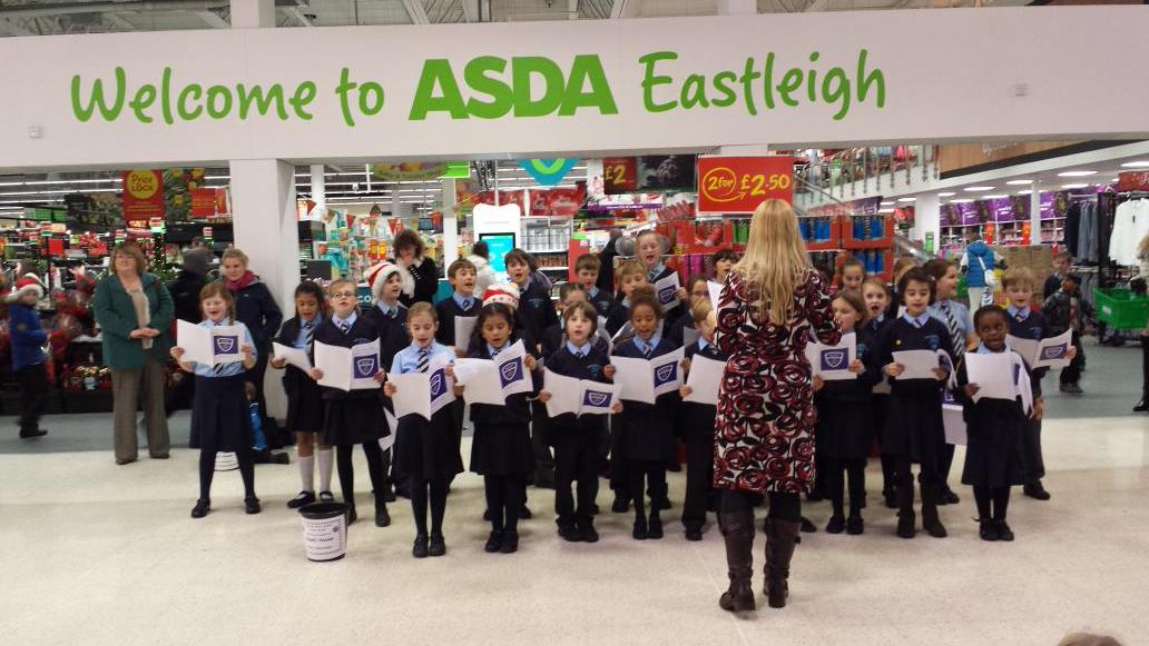 St Swithun Wells School came to sing carols in our foyer. They sang beautifully both with music &amp; without.  #asdaclc