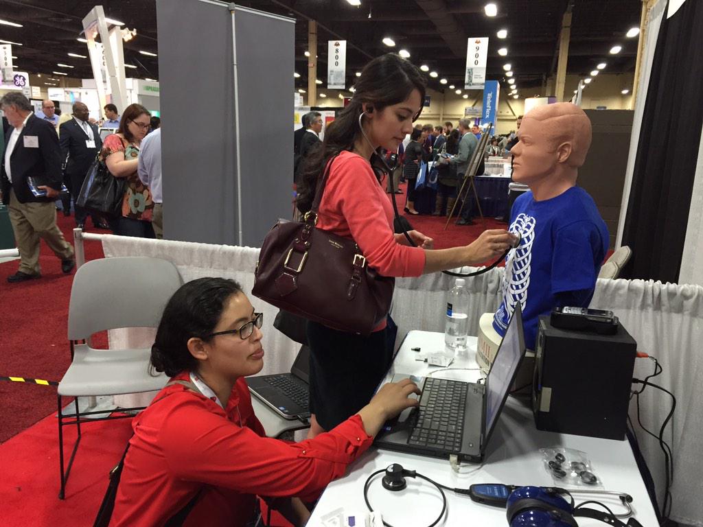 Cardionics_usa's tweet photo. @SSU_1961 students practicing #Auscultation with #SAMII at #AARC14 #MedicalStudents #Heartandlung #Booth908 http://t.co/qvoScCmrvu