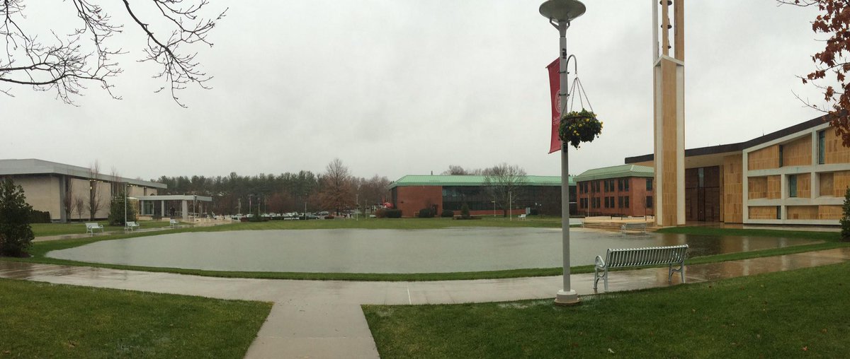 sacredheartuniv's tweet photo. If it freezes tonight, we can go ice skating on the new quad pond! Thanks for the shot @tom_nac. #toomuchrain http://t.co/d0jxjY6YFE