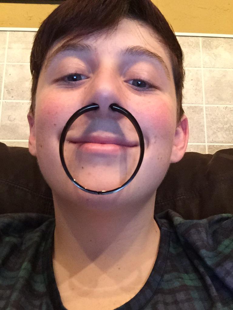 trevimoran's tweet image. Just got my septum pierced #YOLO