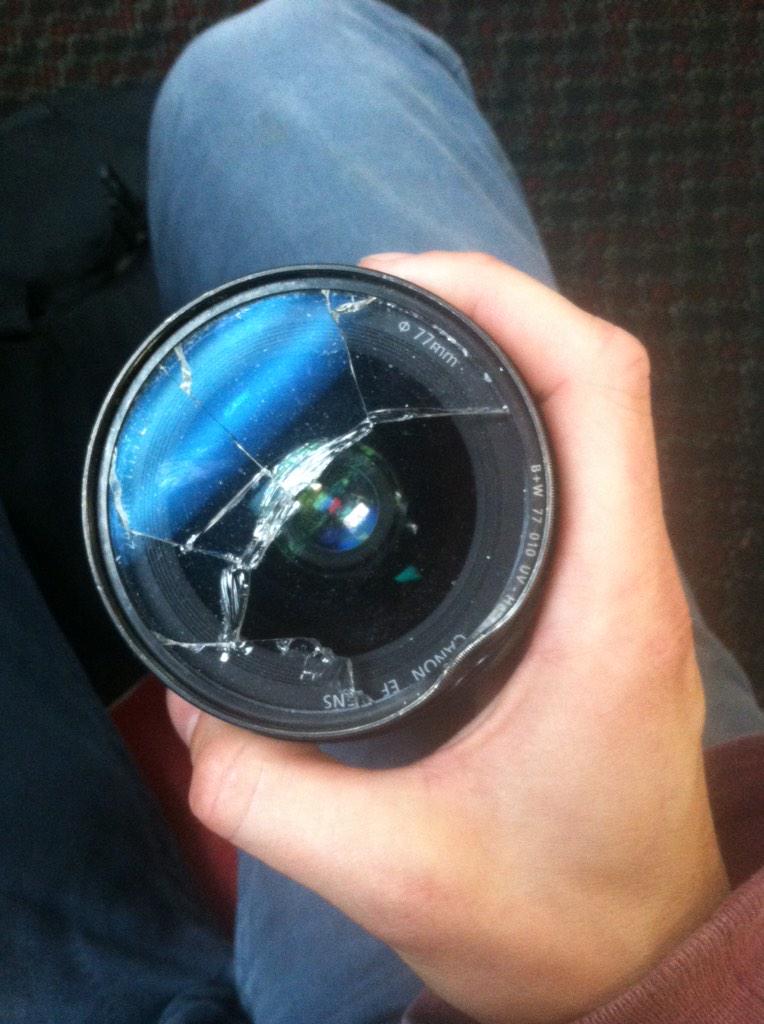 OpBerkeley's tweet photo. Photo of @timhussin's broken lens and the photo he took right before it happened during #berkeleyprotests #OpBerkeley http://t.co/R35hEFGdnx