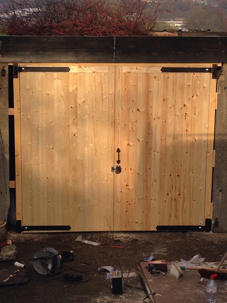 DCCbespoke's tweet photo. Recently fitted nice pine garage doors to a rather wobbly garage. #garage #pinedoors #carpentry #homeimprovements http://t.co/zWS86GHi9e