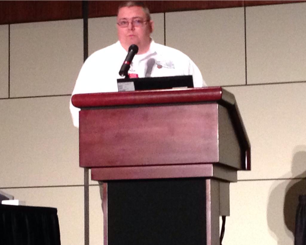 AhimtaSymposium's tweet photo. Region 6 Rep Troy German introducing Douglas "Hound Dog" McClain Rear Admiral,USN ret http://t.co/eSHvwLNjFm