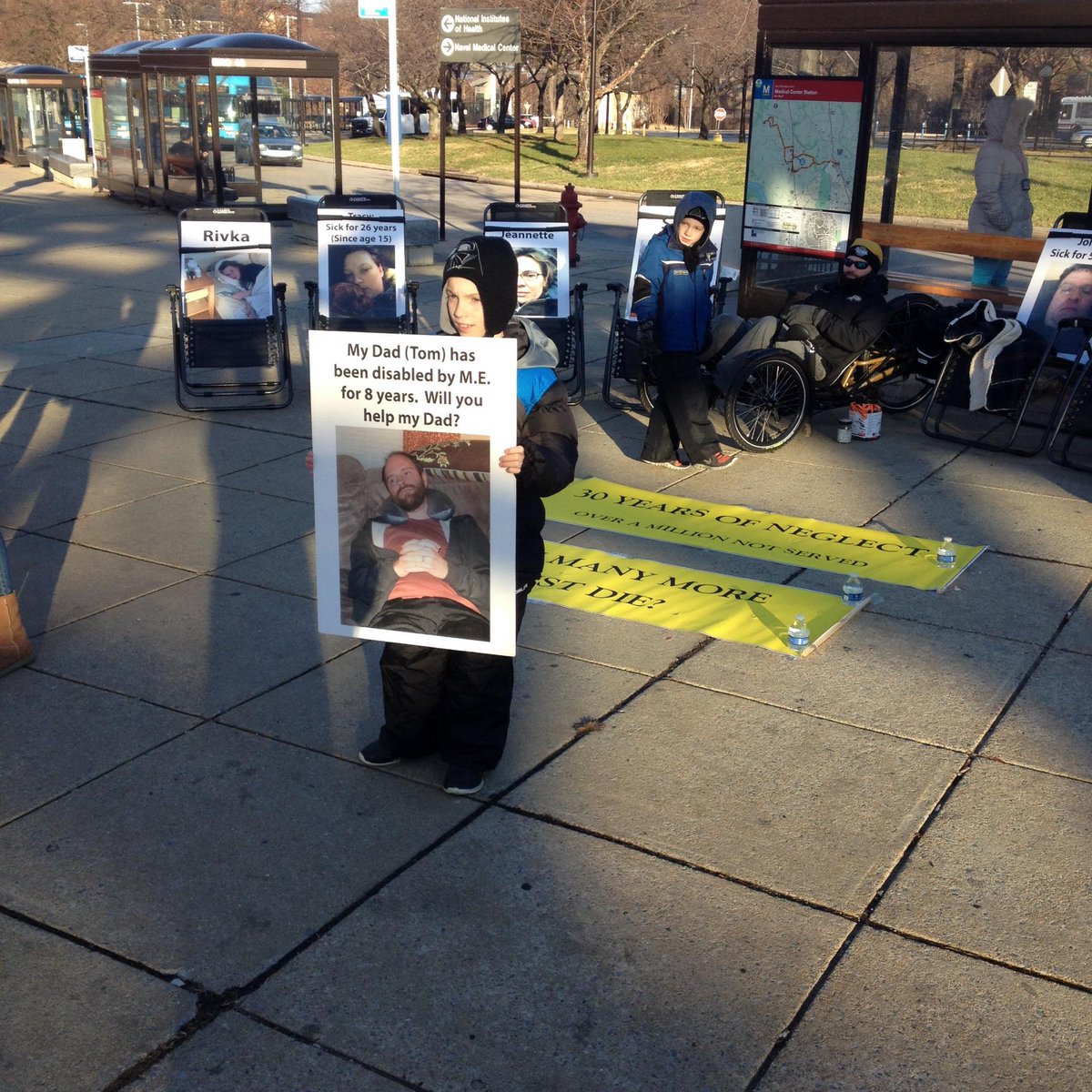 EricaVerrillo's tweet photo. @Reuters Protest happening right now. NIH Campus, Bethesda MD. #MECFS patients oppose P2P meeting. #NIHP2P http://t.co/OPGJdFZ3wo
