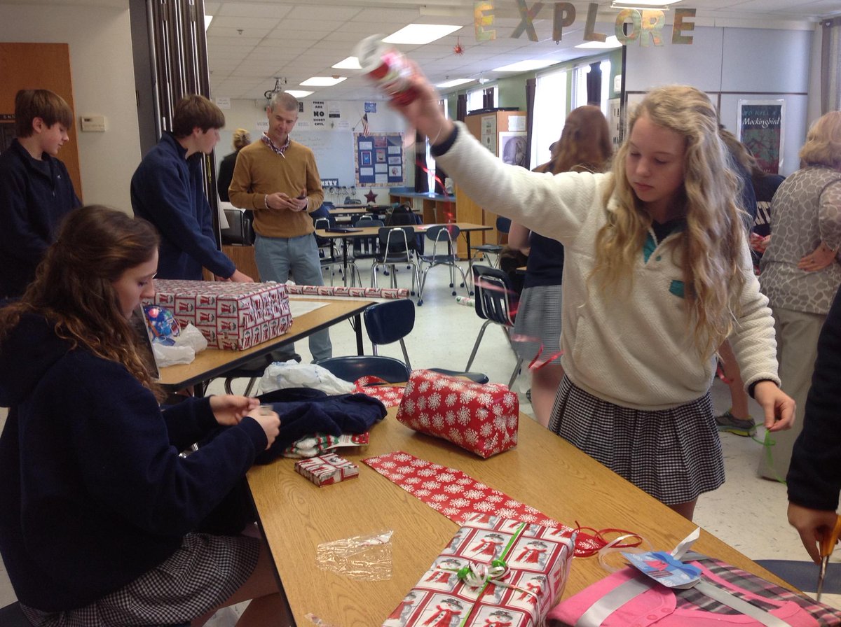 Alto_smith's tweet photo. 8th grade #TrinityNOLA excited to wrap Christmas gifts they bought for BeRealNewOrleans kids! Kids helping kids! http://t.co/4WX1dBdohw