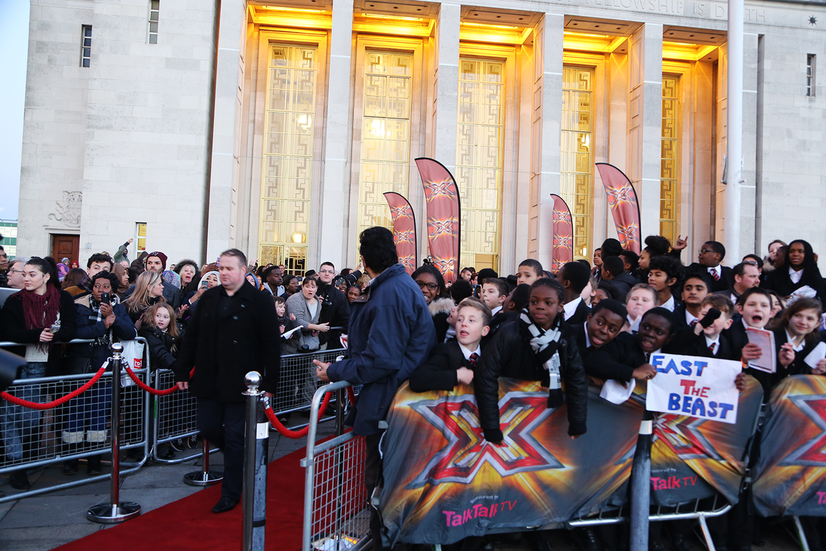 TheXFactor's tweet photo. There's a huge crowd for @FleurEast aka East The Beast (nice banner!) outside Walthamstow Assembly Hall #XFBattleBus http://t.co/udTU57H2wD