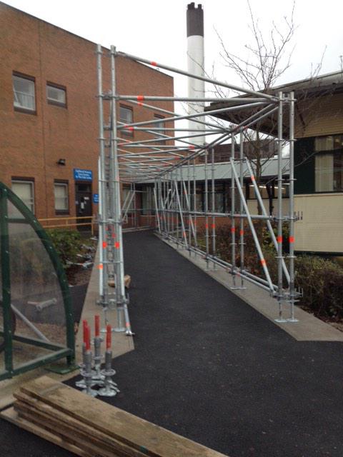 Layheruk's tweet photo. Covered walkway &amp; side enclosed with Layher Protect system - under construction, by the boys at Attridge!! http://t.co/i0HVxCAJvV