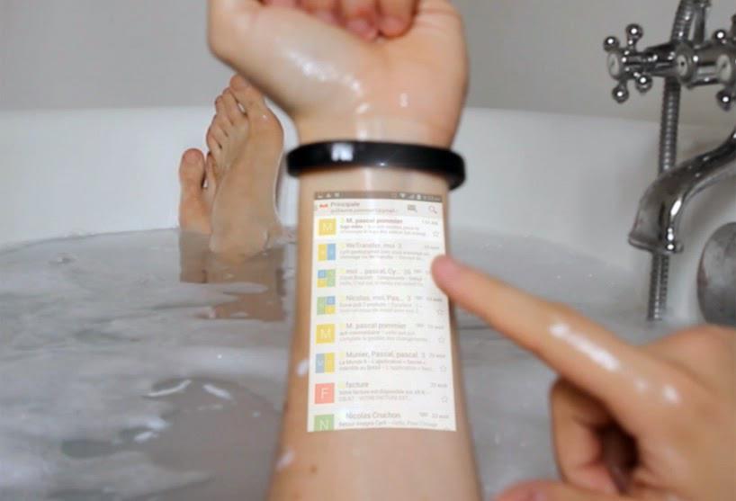 flipinside's tweet image. Bracelet turns your skin into a touch screen device.User read msg,play games,answer calls skin flipinside.com
