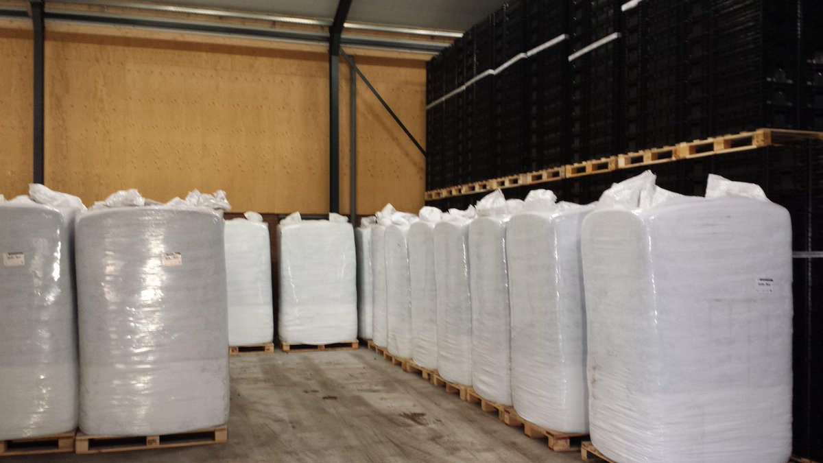The new building is in use for storage of potting soil and new boxes!
