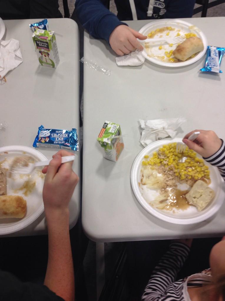 TeacherManSM's tweet photo. It's amazing what a school community can do. Christmas dinner @HolyTrinityCS 460 students fed a meal. #sccdsb http://t.co/9RJOFwfYxE