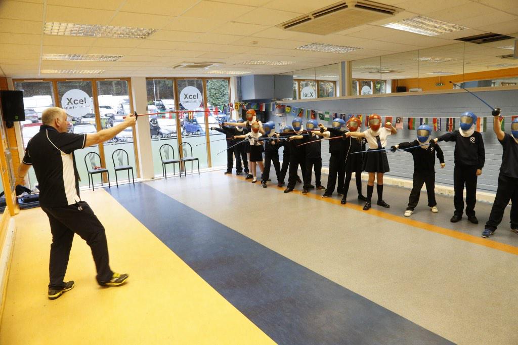 ScottishFencing's tweet photo. #largs schoolchildren try fencing for the first time at the Commonwealth Champs with @SalleRollo coach David Rollo http://t.co/xsBWph8vNx