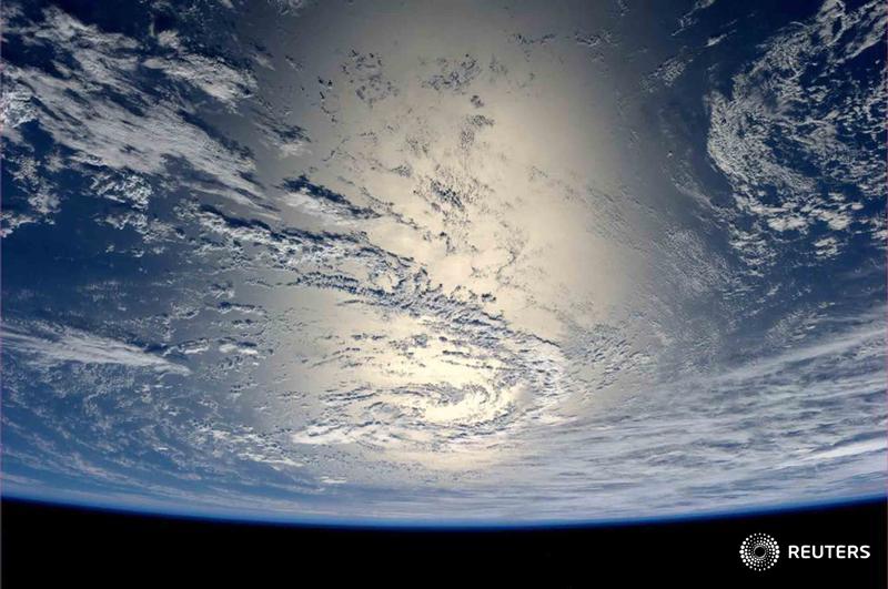 Reuters's tweet photo. PHOTOS: Our most stunning images of space in 2014. http://t.co/iO0M6Ltuye http://t.co/vo1vS8vCHe