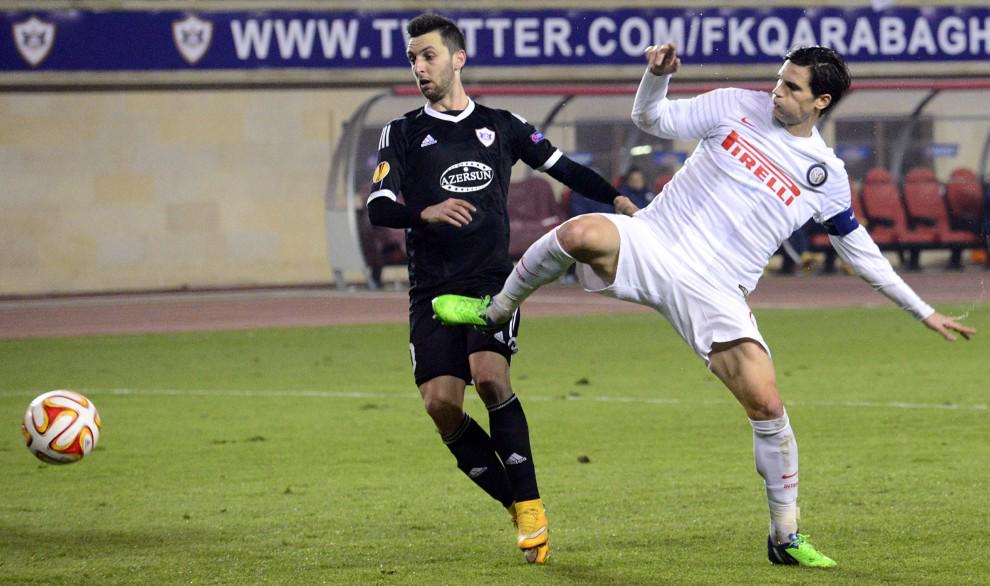 Muarem is challenged by Inter captain Marco Andreolli Muarem is challenged by Inter captain Marco Andreolli