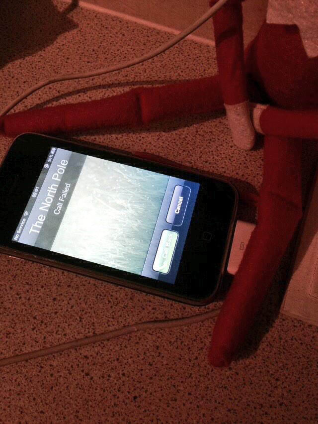 paulaannryan's tweet photo. Poor elf was trying to make an emergency call home! How much fun can you have with a stuffed toy! :-D http://t.co/fU9pitocY8