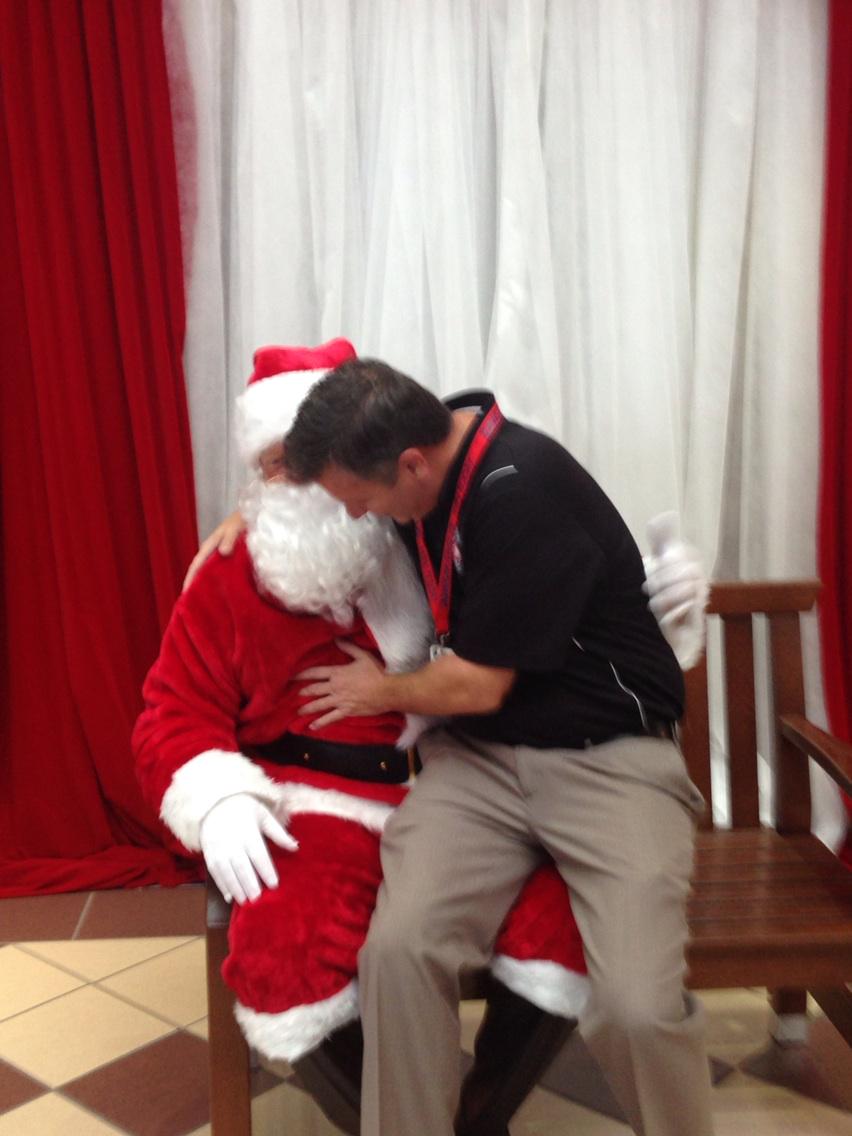 KristinBandy's tweet photo. @DawsonHighSchl Mr. Moody is jiggling Santas Belly. Lol http://t.co/iswpdZfUya
