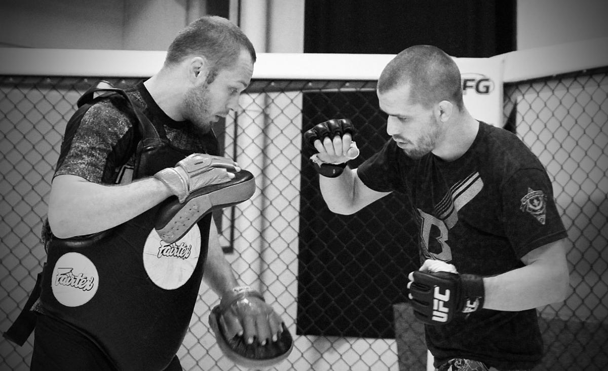 Karhuherra's tweet photo. Brothers in arms. @tipihirvikangas helping @Stonefacemma to put on final touches before UFC Fight Night Brazil. http://t.co/SPKOr9WE6T
