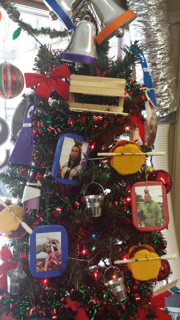 OsageNews's tweet image. #osagenews #christmas2014 office tree is decorated with the In Lon Schka ceremonial dances as its theme.