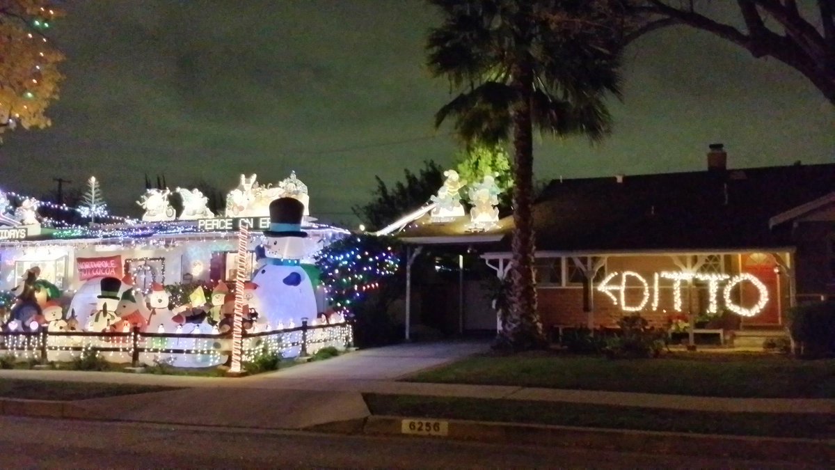 COCOSHELBURNE's tweet photo. When your neighbor looks like Christmas in downtown Disney ditto is about all you CAN do! Guess what city I'm in?! http://t.co/fpyrv7Yp2y