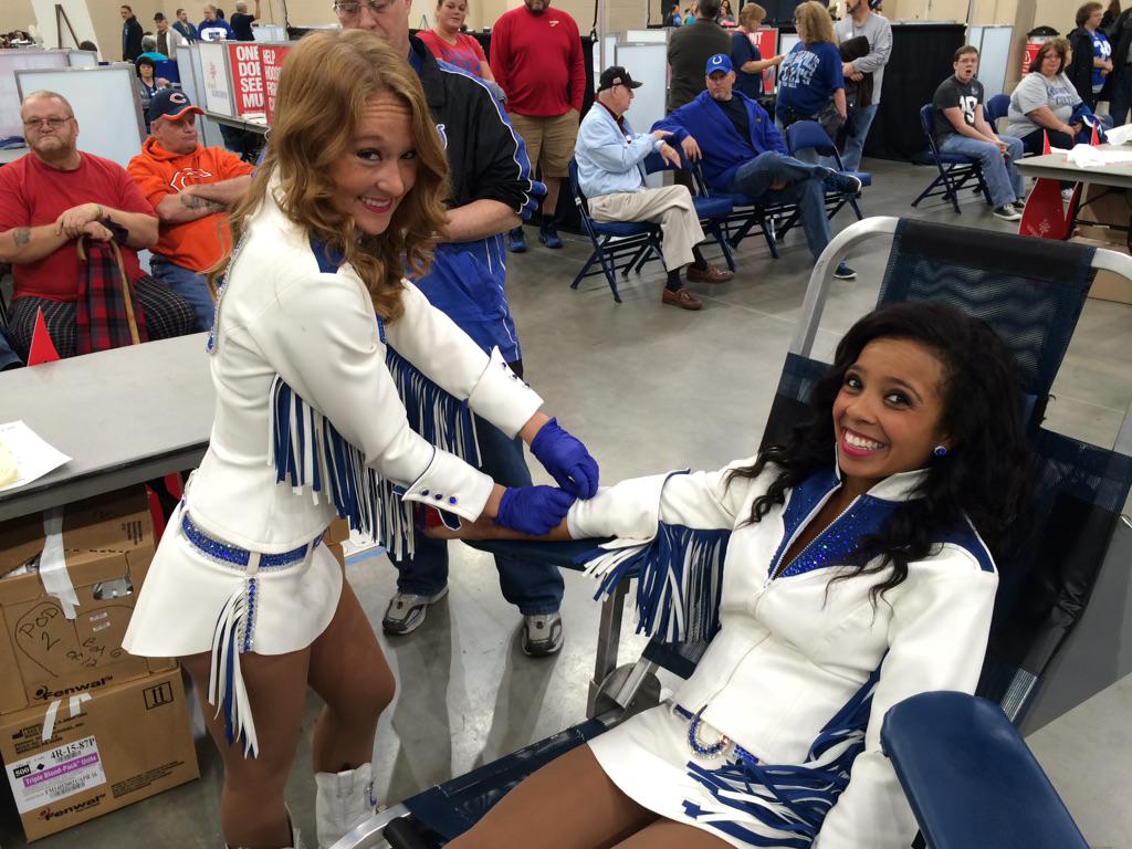 ColtsCheer's tweet photo. #CC_Bri is ready to take your blood! Looks like @NicoleT_CC is up first! It's okay #ColtsNation, she's a nurse! http://t.co/bTOm5aAsKV