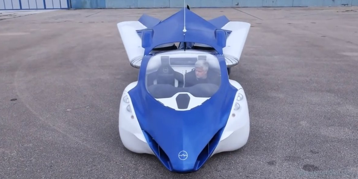 BusinessInsider's tweet photo. This flying car is real and it can fly 430 miles on a full tank @BI_Video http://t.co/wwxTnYZ4CB http://t.co/lgi97mUOl3