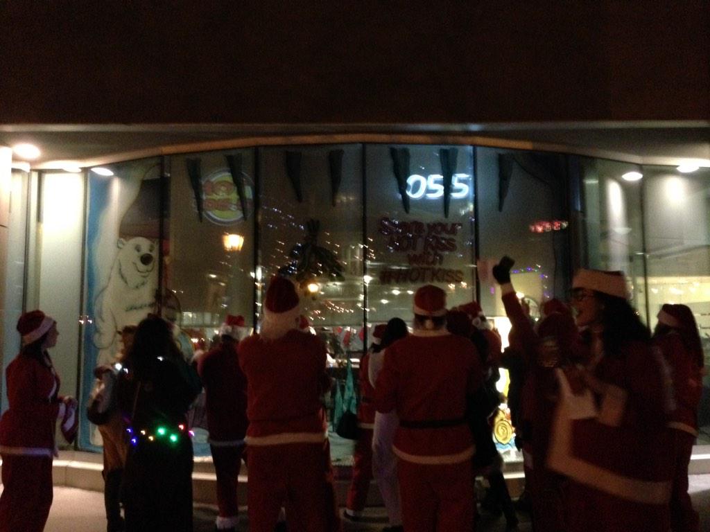 SantaConPEI's tweet photo. Caroling for @HOT1055PEI ... Who doesn't love 35 Santas?! #Santacon2014 #PEI #HOHOHO http://t.co/a0lHid39DG
