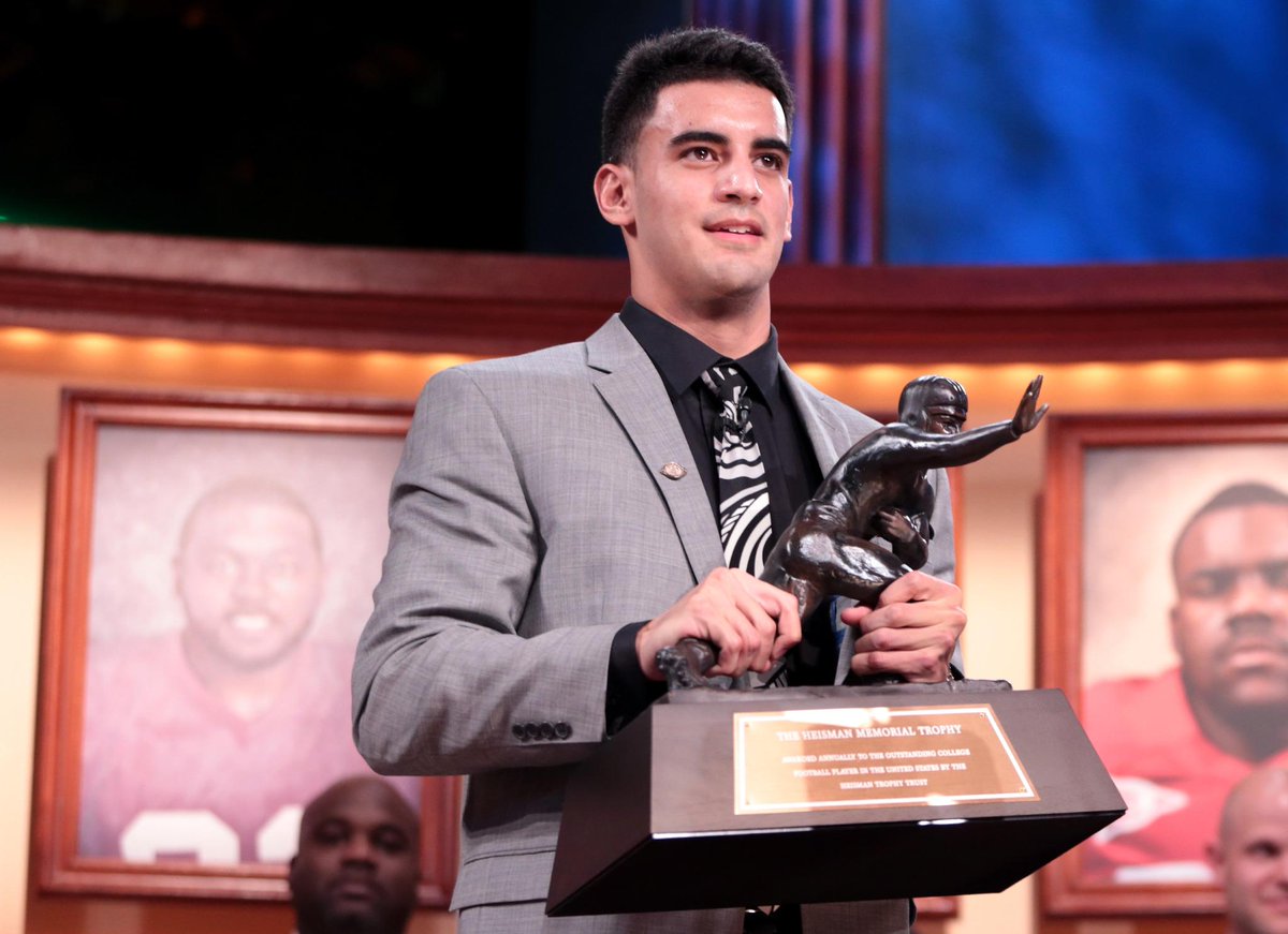 SportsCenter's tweet photo. Marcus Mariota becomes 1st player in Oregon school history to win the Heisman Trophy. http://t.co/fk3pshh2fw