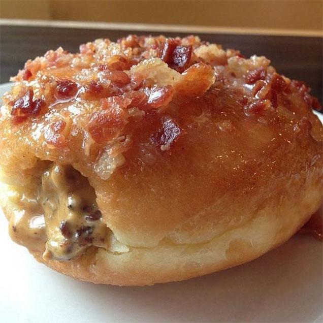 I am both disgusted and obsessed with this concept. Would I eat this? Yes I would. #BaconCheeseBurgerStuffedDoughnut
