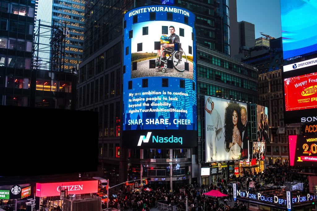 NasdaqExchange's tweet photo. Michael, your ambition lit up the @Nasdaq Tower! 🔥#IgniteYourAmbition @MikejRacing http://t.co/HE3g7wp3M6