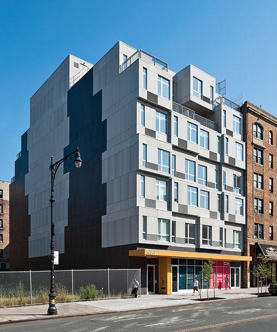 dwell's tweet image. It took less than a month to assemble this entirely modular apartment building in #NYC: bit.ly/1znAiE0