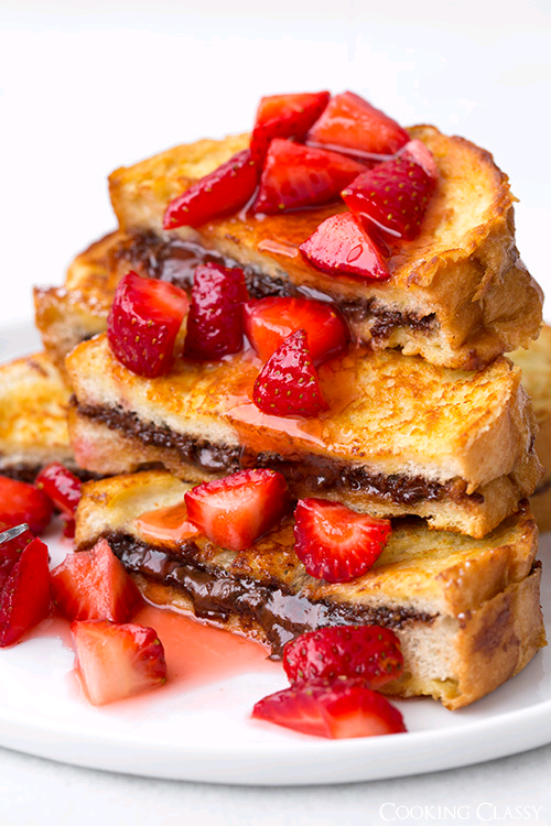 FoodPornAww's tweet photo. Nutella Stuffed French Toast with Macerated Strawberries http://t.co/uFd3advZSK
