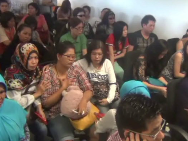 RT_com's tweet photo. #QZ8501: Search for missing #AirAsia flight halted till morning, relatives gather at airport http://t.co/ZCXD1oji0s http://t.co/euWFXcgdW1
