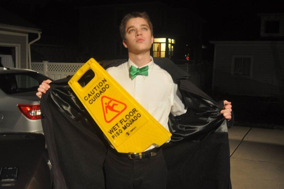 jacob_renk's tweet photo. The adventures of a man and his caution wet floor sign. Pt. 1 http://t.co/YeIh5O9YEu