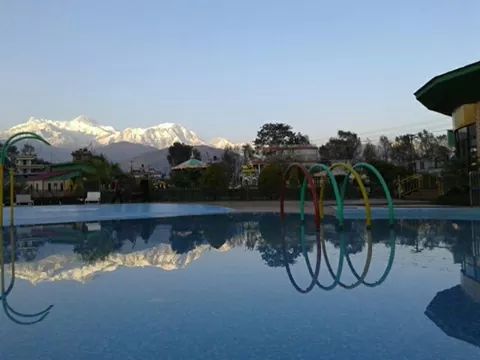 ChaChaWhee's tweet photo. It is refreshing to see a lot of snow in the mountains and mountain's reflection on our pool. http://t.co/FNxELeSOgM