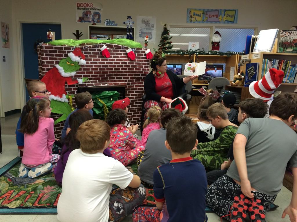 Grinch Day at Lakeside Academy! Dawn, our Librarian reading to the Grade 1-4's! <a href="/NLESDCA/">NLESD</a> <a href="/EDU_GovNL/">Education and Early Childhood Development</a>