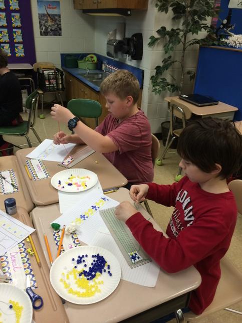 TerriStoff's tweet photo. Making wampum belts in 4th grade @NortheastES http://t.co/vS1SLqLggH