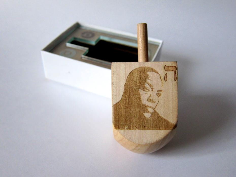 thefader's tweet photo. Dr. Dreidel is this year’s hottest #Hanukkah accessory. http://t.co/PHokS05DhF http://t.co/f0oFLbzgJD