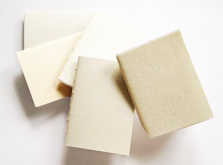 TrinityStPress's tweet image. New item: Soft white and cream decorative paper notebook mixed bag by TrinityStreetPress (10.00 CAD)