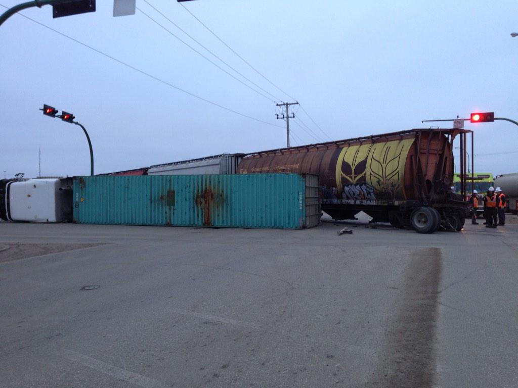 MJFire's tweet photo. MJFD on the scene of a train vs semi collision at 9th Av and High St W. Traffic is being diverted. #CityMJ #MJFD http://t.co/C06A4jFA86