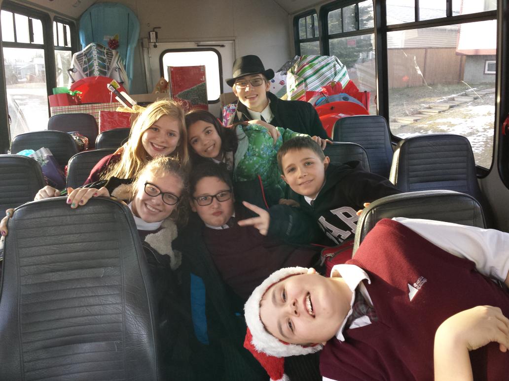 SKapitza's tweet photo. Delivery time for #adoptedfamilies #theseasontogive #kidshelpingkids @rundleacademy @whiting_lisa http://t.co/XR1Ytzi1pU