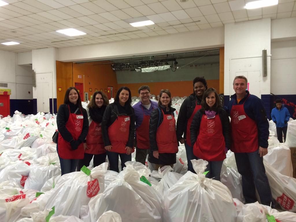 AstellasUS's tweet photo. #ChangingTomorrowDay: @AstellasUS team volunteers at @salarmynca Angel Tree event, handing out gifts to DC families. http://t.co/tUK4F7JYLw