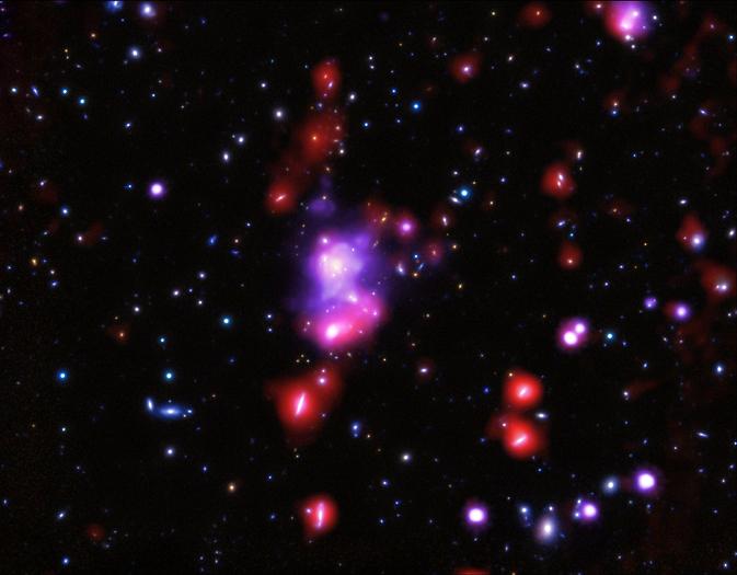 NASA's tweet photo. Meanwhile, 9.6 billion light years away, is galaxy cluster 'Gioiello.' @chandraxray weighs it: http://t.co/Ovd0Gap4ho http://t.co/SKKME6SwsC