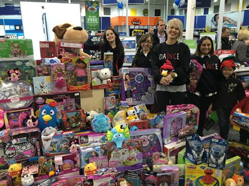 salvationarmyon's tweet photo. @danceinccompany is building a @ToyMountain We @tsatoronto thank you. #tm2014 http://t.co/vZ6Sma5a2C
