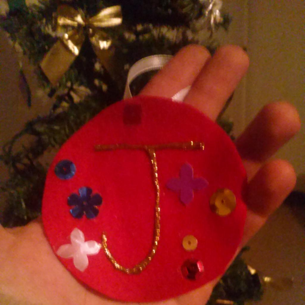 audramckee23's tweet photo. Christmas ornaments my babies made me at school today...I love them so much so sweet <3 http://t.co/zZbALWsHz5