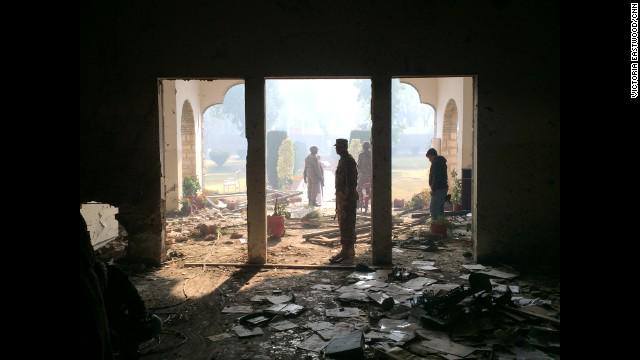 cnni's tweet photo. "Pools of blood are everywhere," @NicRobertsonCNN describes scene of #PakistanSchoolAttack http://t.co/ccjJbq3kKy http://t.co/badxoG89p2