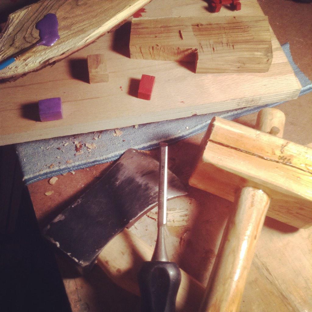 Carving and painting the gifts for the wood sled.