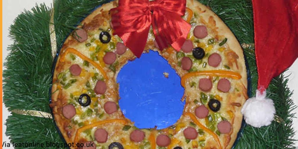 A wreath made off pizza. #Whaaaat? bit.ly/1AC76Lr