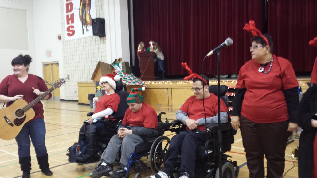 Welcome #harmonyinaction to the #edhschristmasassembly2014 @EDHS_Students #raiderpride